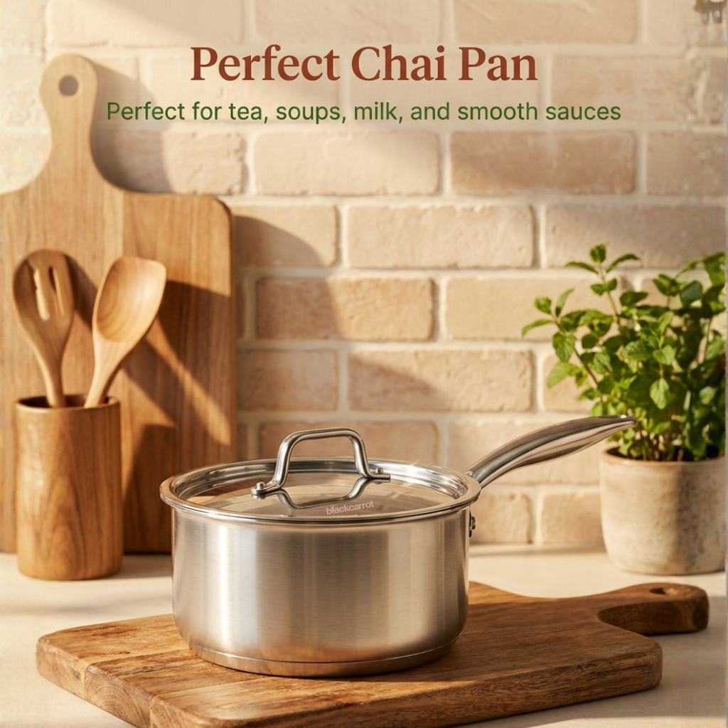 BlackCarrot triply stainless steel saucepan with lid displayed on a kitchen counter with wooden utensils