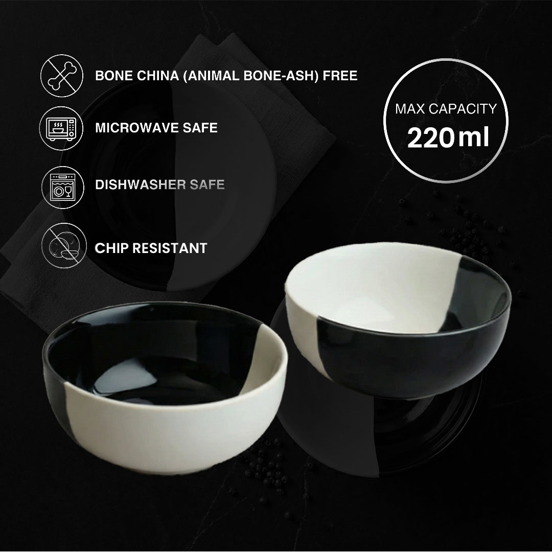Two black and white ceramic bowls with product features on a dark background
