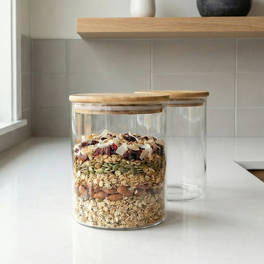BlackCarrot-glass-jars-with-blackcarrot-wooden-lids-filled-with-blackcarrot-granola-on-blackcarrot-kitchen-counter-for-blackcarrot-organized-storage