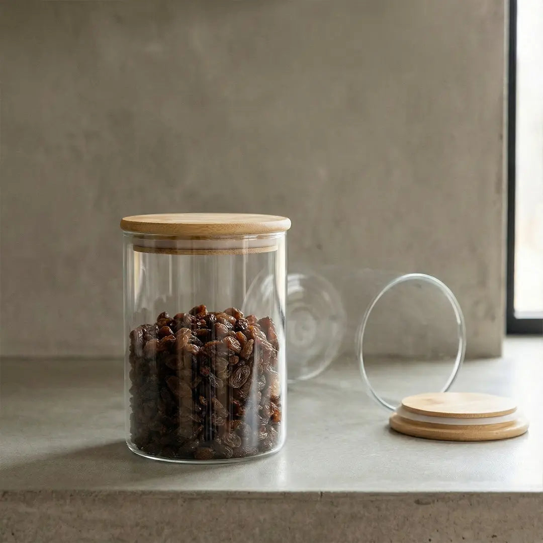 BlackCarrot-glass-jar-with-blackcarrot-wooden-lid-containing-blackcarrot-dried-fruits-on-blackcarrot-concrete-surface-for-blackcarrot-organized-storage