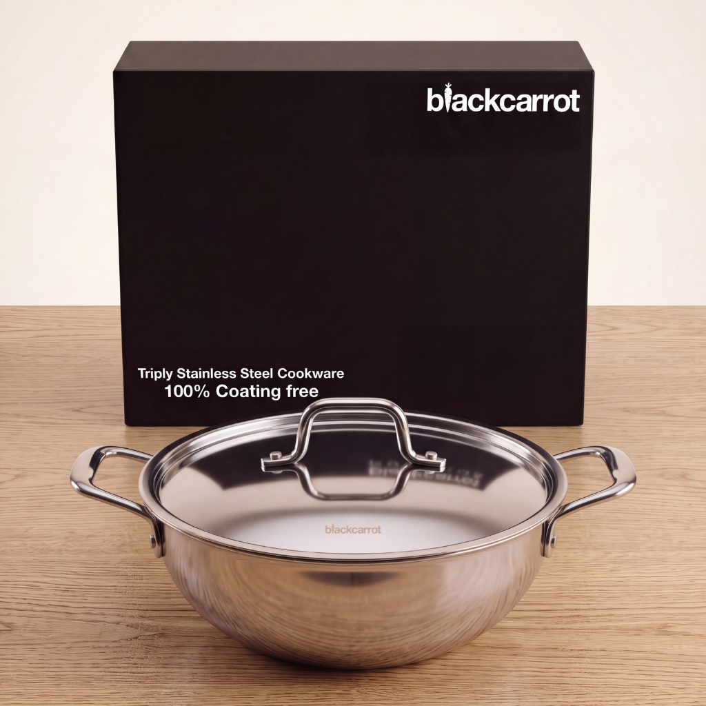 BlackCarrot triply stainless steel kadhai with lid placed beside its branded packaging box