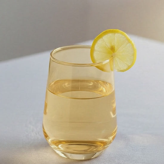 set-of-clear-shot-glasses-with-red-tequila-salted-rim-and-lime-wedges-on-wooden-table